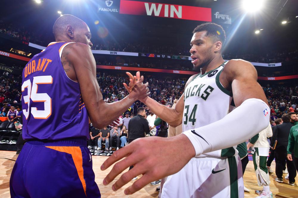 尽管她在比 尽管她在比